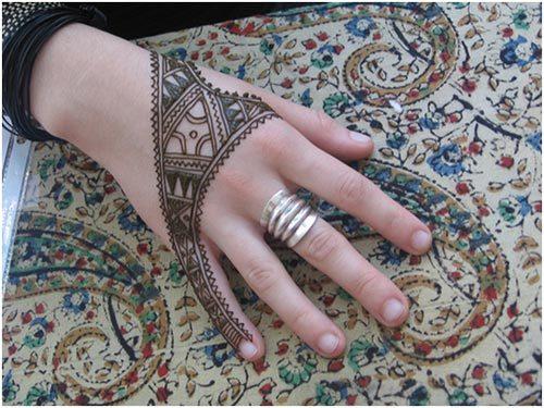 Modern twist back hand mehendi design