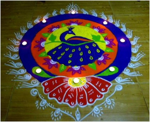 Peacock rangoli design with flowers for competition