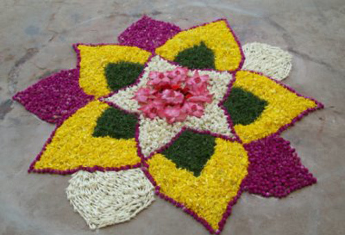 Small rangoli design with flower petals
