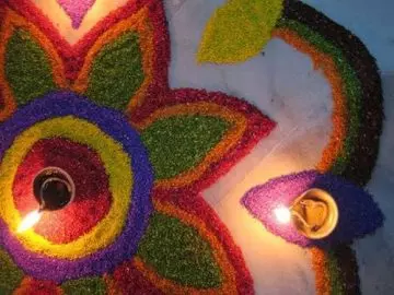 Unique rangoli design for Diwali with flower petal pattern