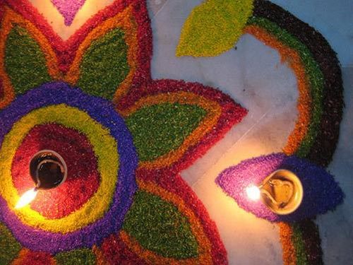 Unique rangoli design for Diwali with flower petal pattern
