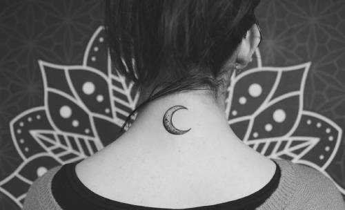Traditional half moon tattoo on the back of neck