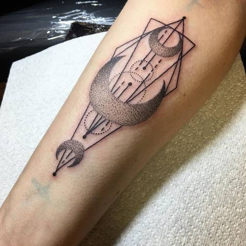Geometric moon tattoo on the sleeve