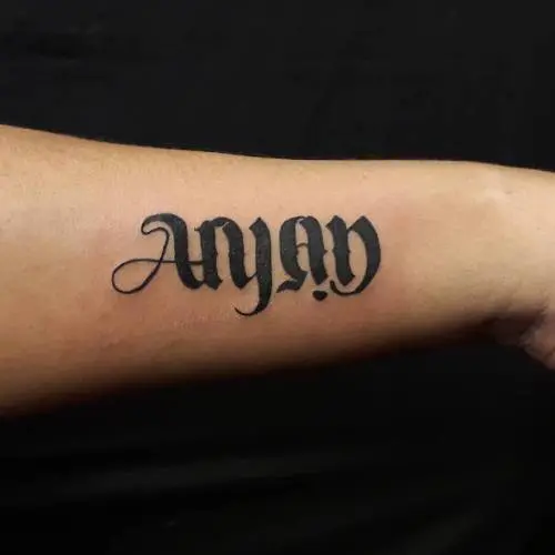 Dual ambigram tattoo