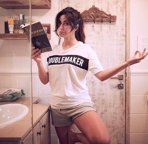 Katrina Kaif without makeup reading a book