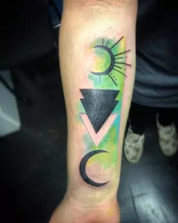 Abstract watercolor crescent moon tattoo