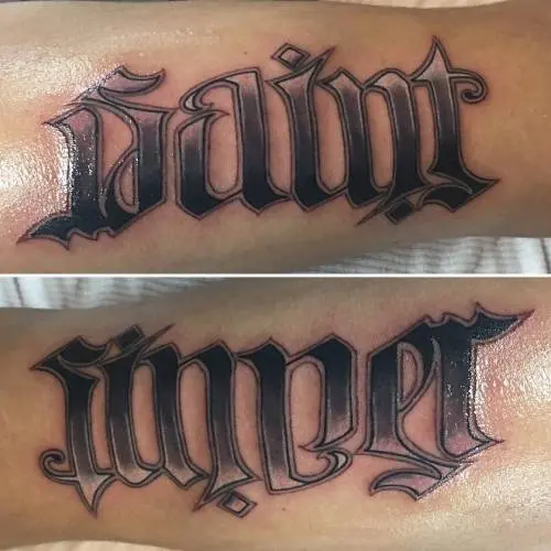 Saint-Sinner ambigram tattoo