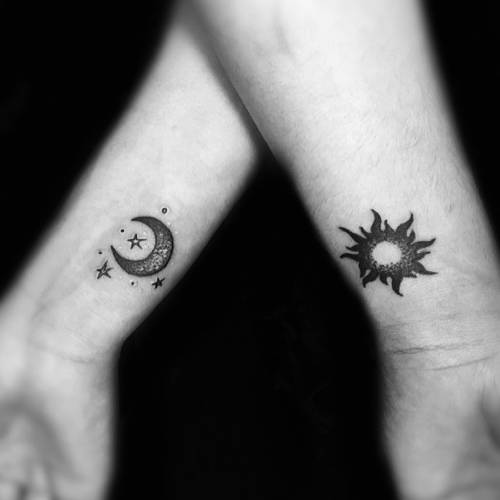 Small crescent moon tattoo