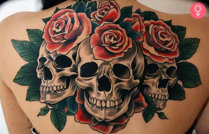 3 skulls tattoo on the back