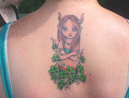 A fairy with bull horns tattoo