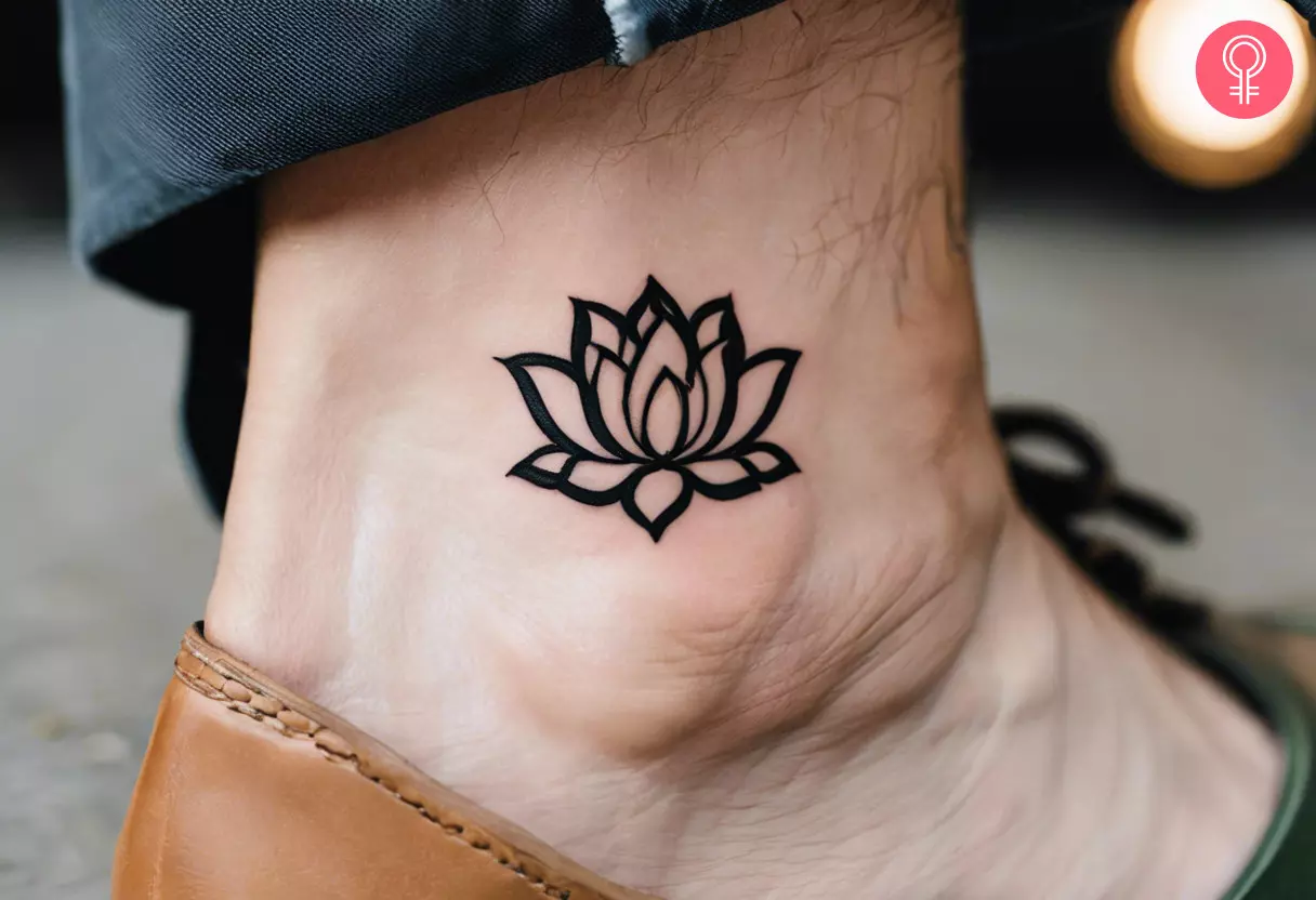 A bold ink lotus tattoo