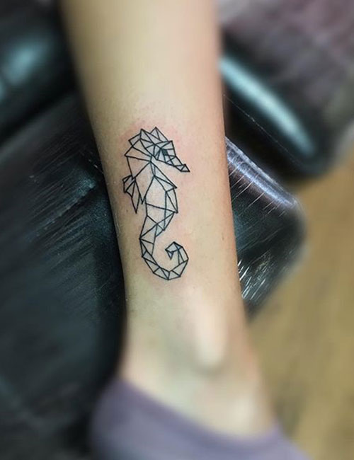 Abstract ankle tattoo