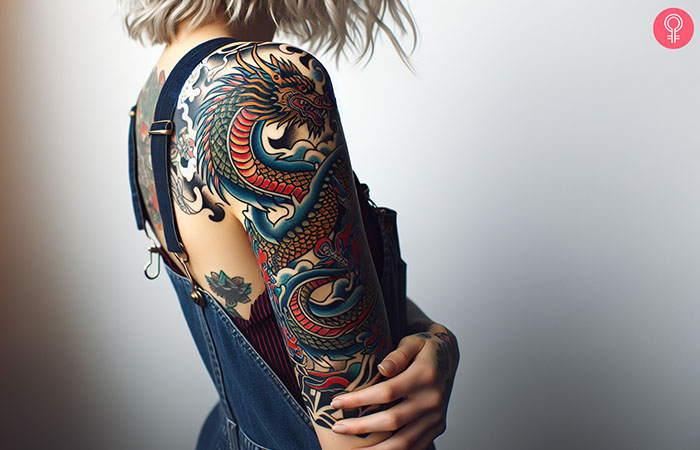 An American traditional-style dragon tattoo on the upper arm.