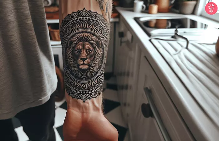 An animal mandala tattoo on the forearm