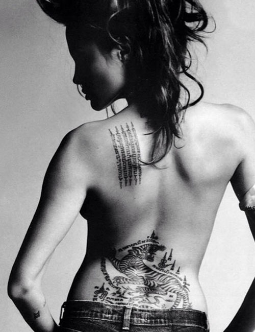Angelina Jolie tattoos  from Billy Bob to Brad Pitts spiritually  binding Thai inkings drawn by exmonk Ajarn Noo Kanpai  The Sun