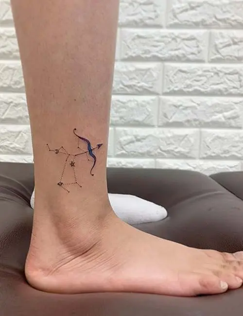 Arrow and constellation ankle tattoo