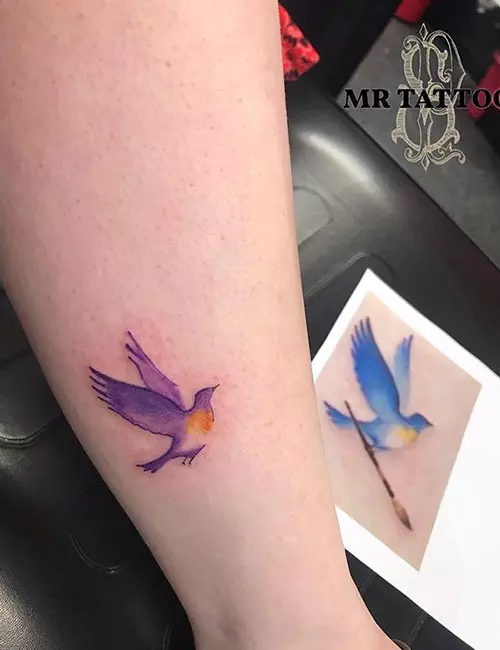 Small watercolor bird tattoo design