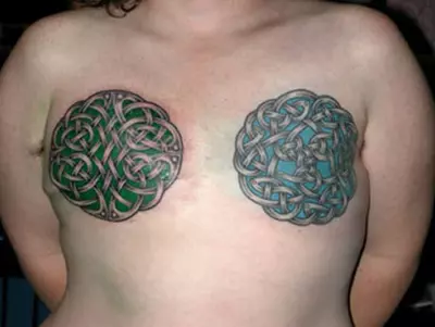 Celtic breast tattoo