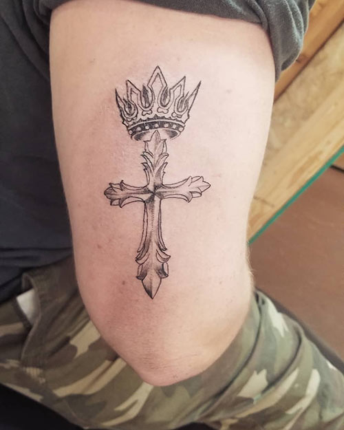Cross and crown tattoo