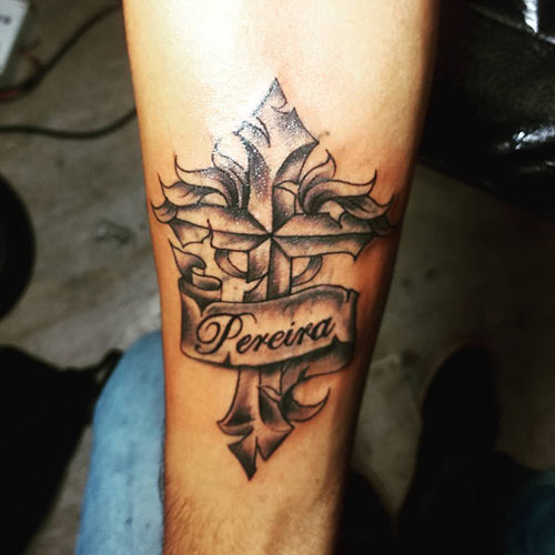 Cross tattoo with the name