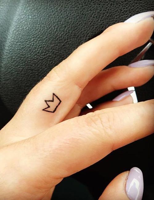 Small crown tattoo design on finger