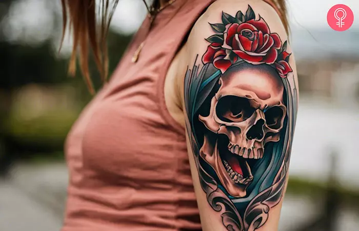 Crying skull tattoo on her arm