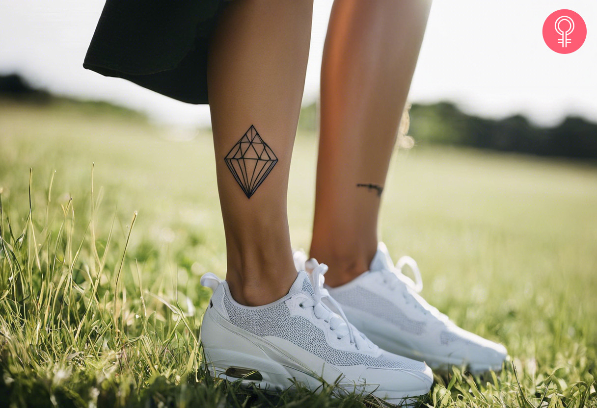 A woman with a diamond tattoo on her calf