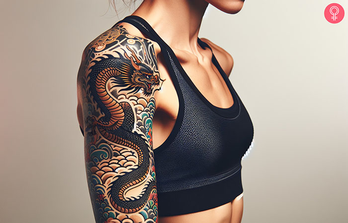 A woman with a dragon tattoo on her shoulder.