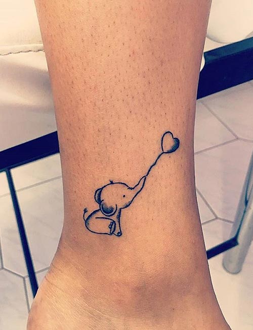 A cute little elephant tattoo design