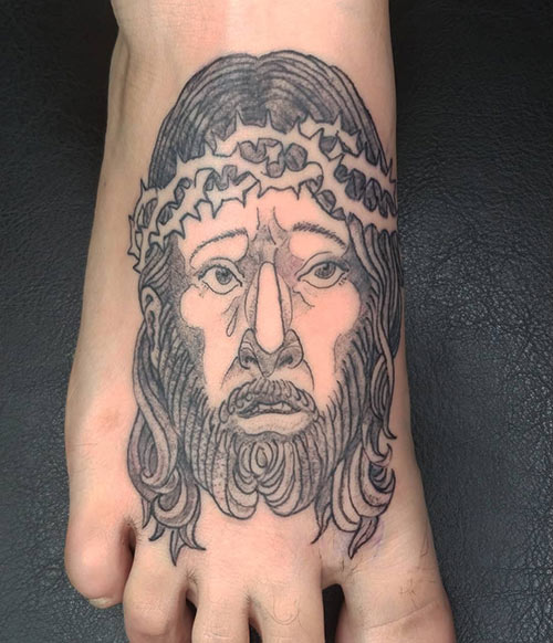 Jesus tattoo on the foot