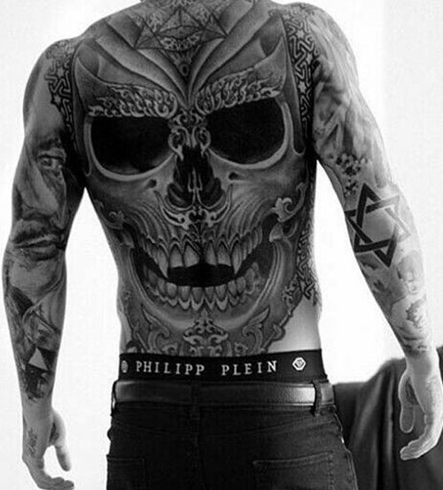 Large Black And White Skull Tattoo On Back