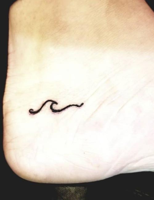 Mni ocean wave ankle tattoo