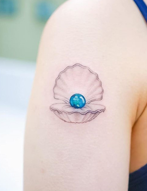 Small pearl tattoo design on shoulder