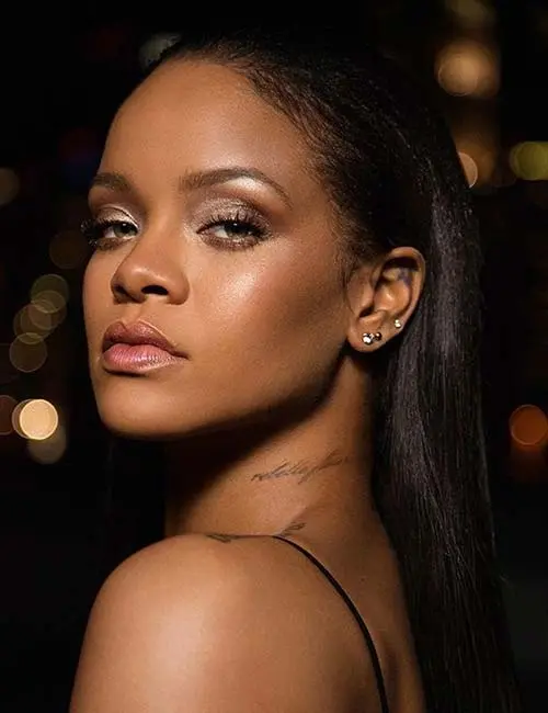 Rihanna Rebelle Fleur Tattoo On Her Neck