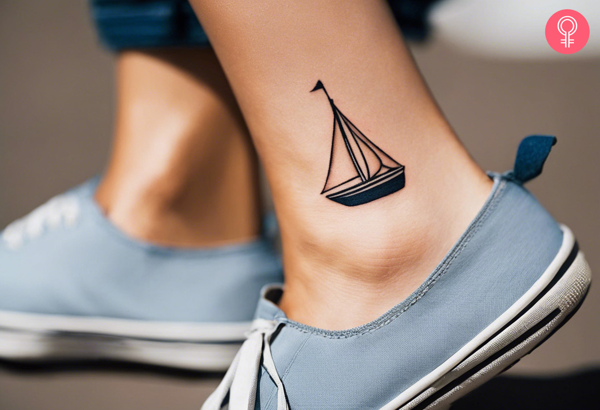 A woman with a sailboat tattoo on her ankle