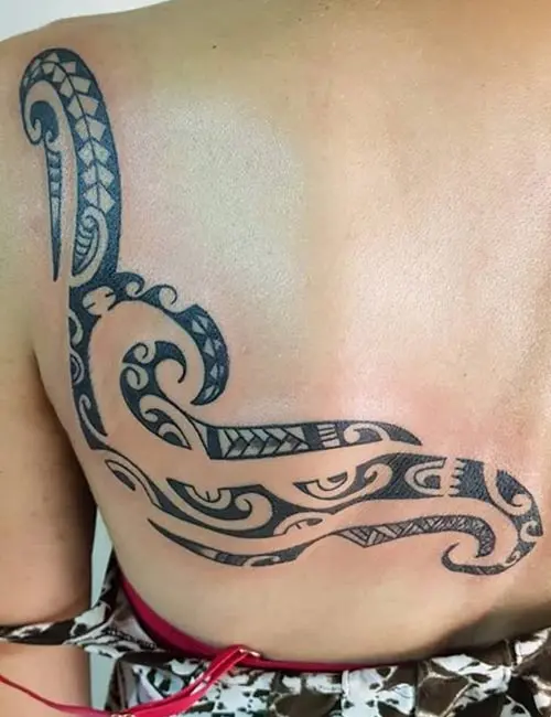 Simple Maori tattoo design on the upper back