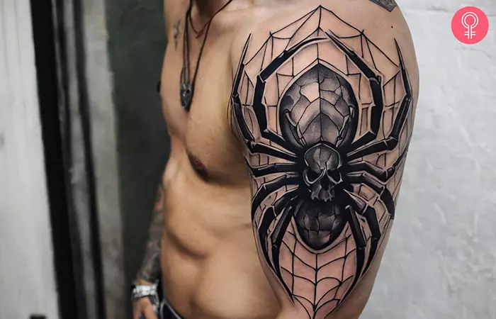 Skull spider tattoo on the arm
