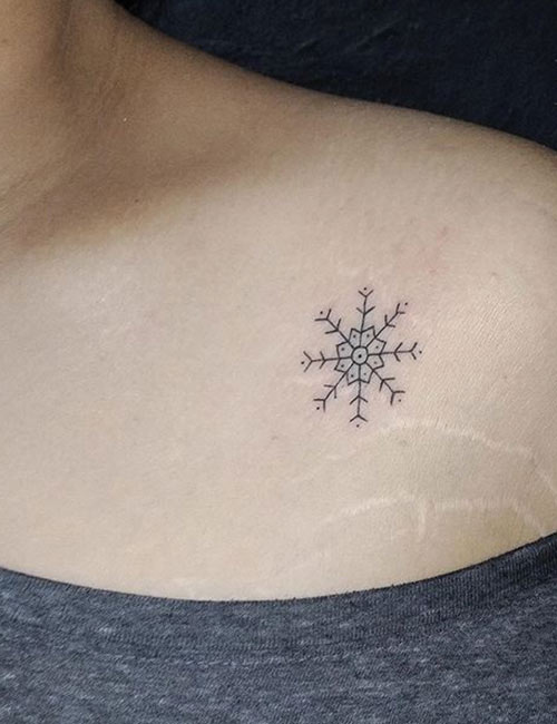 Small snowflake tattoo design