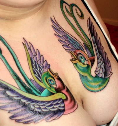 Sweet bird breast tattoo