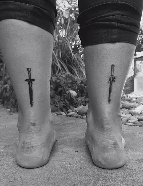 Sword ankle tattoo