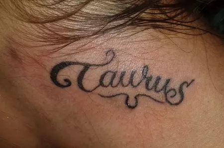 Tattoo design with Taurus word written for a simple look
