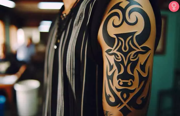 Taurus tribal tattoo on the arm 