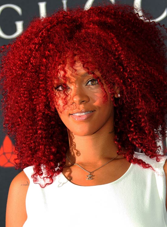Funky tight voluptuous copper red curls hairstyle for girls