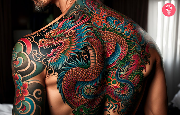 A man with a traditional dragon tattoo on his back.