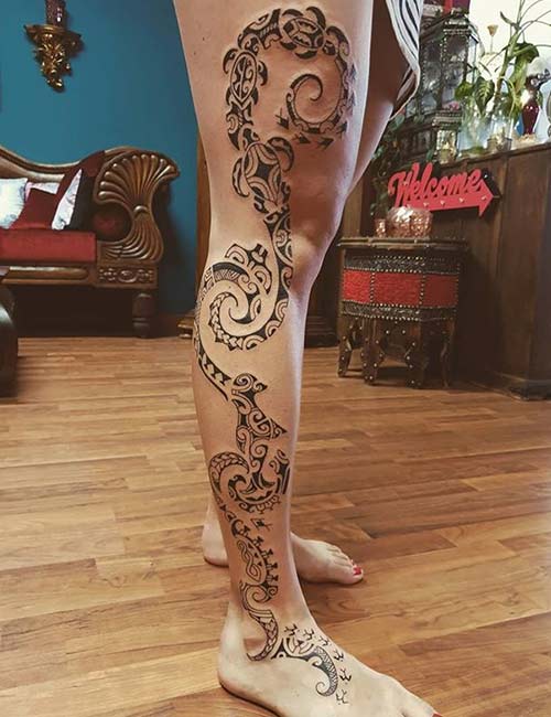 Traditional Maori tattoo design on leg