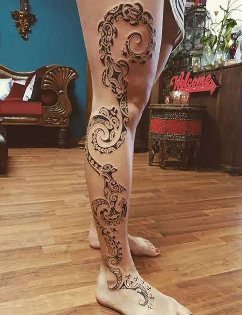 Traditional Maori tattoo design on leg