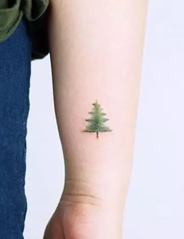 Small tree tattoo design on hand