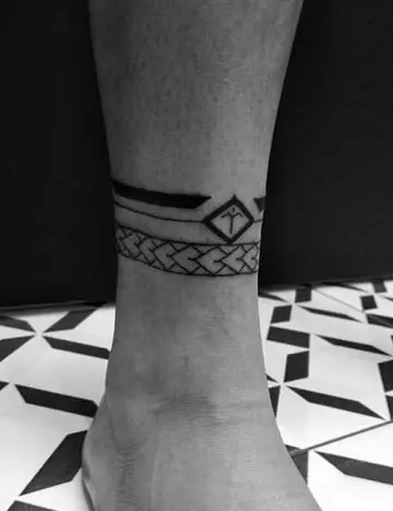 Tribal ankle tattoo