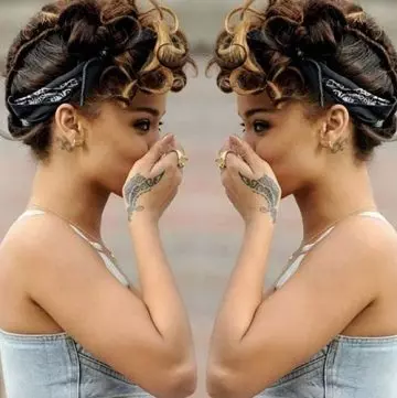 Rihanna Tribal Tattoo Design On Her Hand