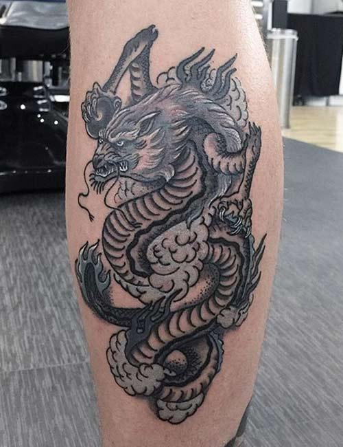 Tattoo uploaded by Joe  Dragon wrapped around via IG   victorjwebstertattoo linework victorjwebster blacktattoo lines  decorative creatures dragon  Tattoodo